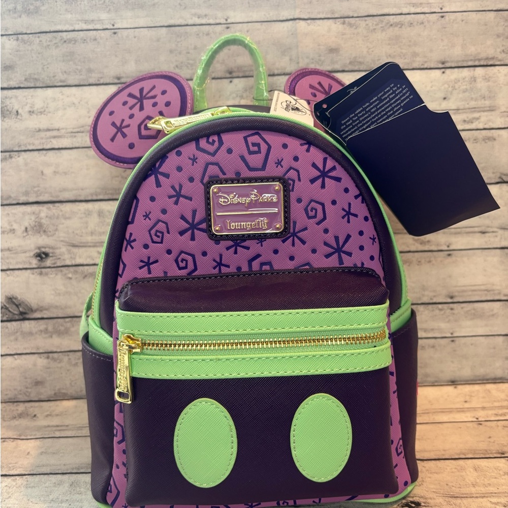 Loungefly The Main Attraction Mad Tea Party Backpack